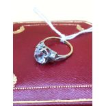 An 18ct gold ladies ring set with a large CZ stone. Size H. (2.5Grams)