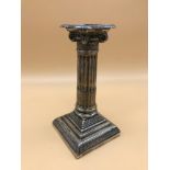 A single Sheffield silver Corinthian Column candle stick. Made by Hawksworth Eyre & Co Ltd.