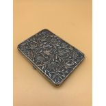 Solid silver ornate cigarette case. Tested positive for silver. Gilt to the inside.