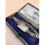 A 9ct Gold cased Art Deco ladies watch. working order.