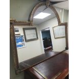 A Large Regency mirror, Detailed with gilt edging and finial top. Measures 167x218cm