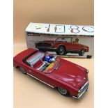 Alps Mercedes Benz 230sl Cabbie tinplate red car. Comes with original box