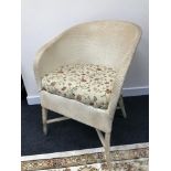 A Vintage Llyod loom style bedroom chair.