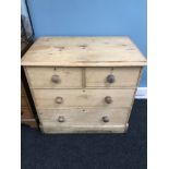 A Victorian Pine 2 over 2 chest of drawers. Measures 83x91x55cm (Missing centre back panel)