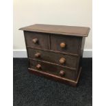 Antique apprentice pine 2 over 2 chest of drawers. Measures 39x45x21cm