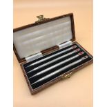 A Lot of 4 boxed Sterling silver bridge card game pencils