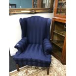 An Antique Whytock & Reid Edinburgh high back gull wing arm chair. Fully reupholstered with arm