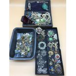 A collection of costume brooches includes silver filigree, A Jewel box filled with various vintage