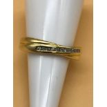 18ct gold ladies ring set with diamonds. Size P. 2.63grams