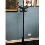 A Vintage bentwood coat stand. Measures 190cm in height.