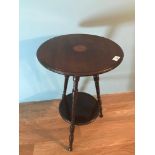 A Two tier Edwardian barrel table made by James Shoolbred & Co London. Measures 61cm in height