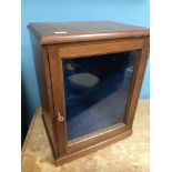 An antique display cabinet with blue velvet interior. measures 42x32x25cm