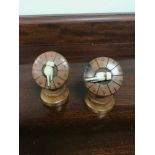 2 Victorian wood and ivory game counters. Measure 6cm in height.