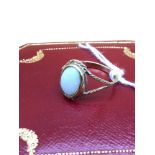 A lovely example of an 9ct gold ladies ring set with a large opal stone. Size M, 2 Grams