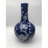 A Chinese Qing Dynasty blue & white floral design vase, 28cm in height