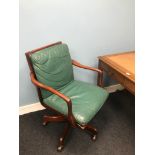 Green leather desk chair.