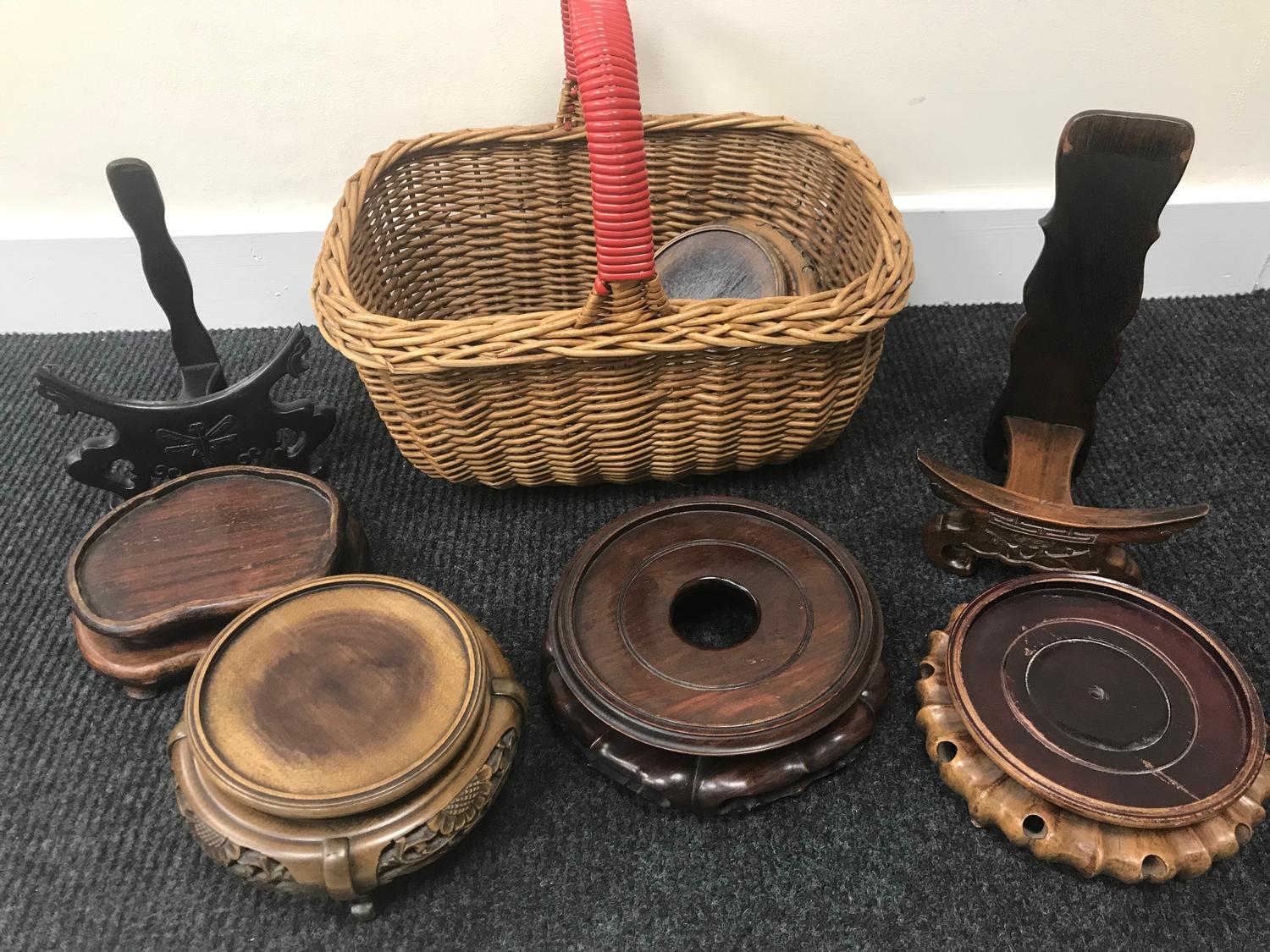 A Basket full of oriental hardwood stands