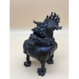 An early 1800's Chinese bronze Foo dog censor burning pot, 15cm in height