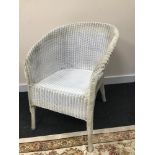 A Vintage Llyod loom style bedroom chair.