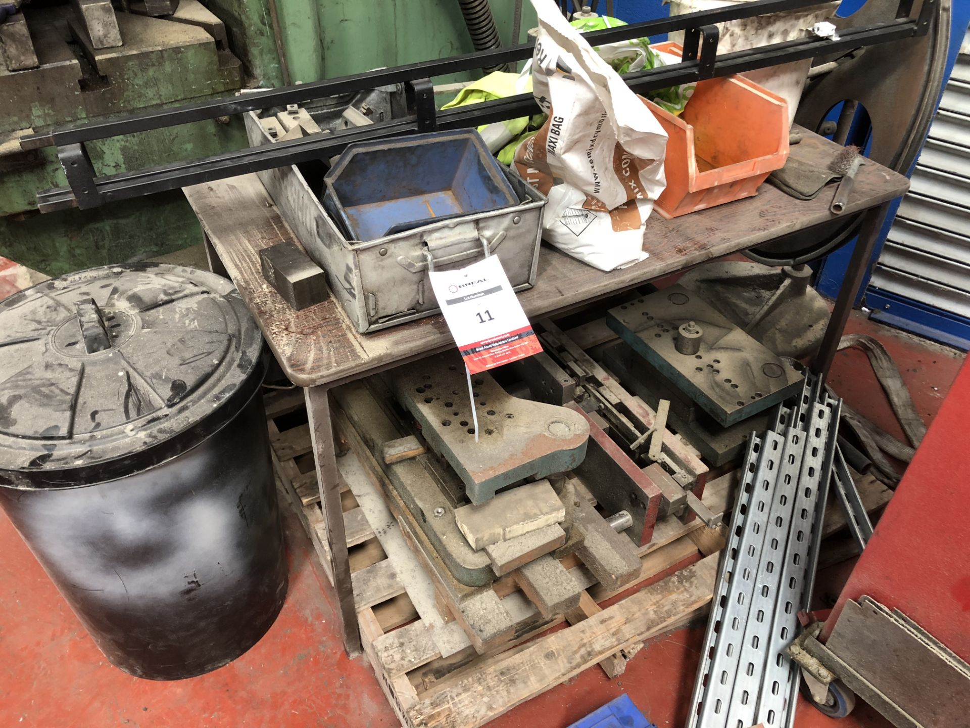 Pallet & table containing assorted press tooling