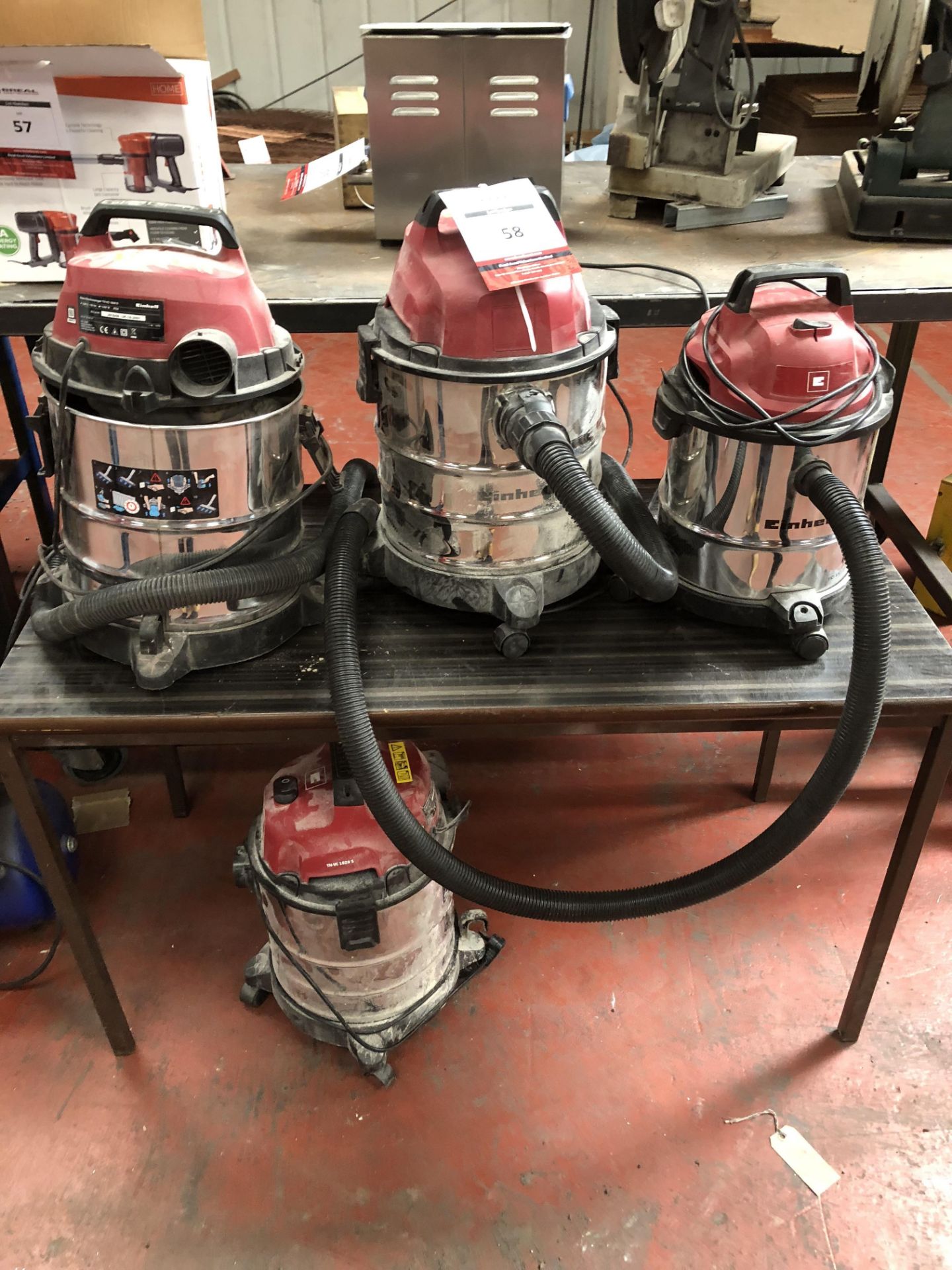 4 x Einhell Vacuum Cleaners and Table