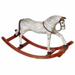 Victorian Rocking Horse, c. 1870England. Carved head and legs, glass eyes, stuffed body, white-