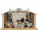 Colonial Goods Doll's Shop, c. 1920Probably by Moritz Gottschalk. 14 drawers in storage cabinet,