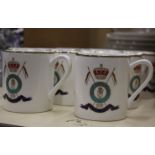 A group of Royal Kendal gilt decorated bone china mugs and saucers bearing Royal Irish emblem