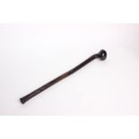 Tribal Art: A West African ebony fighting club/ceremonial stick with bulbous single end, the shaft
