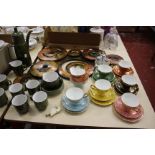 A regency harlequin colour part tea set (six trios and two other items), a metal sculpture and a