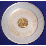 A modern parcel-gilt Elizabeth II silver commemorative silver platethe centre embossed, and engraved