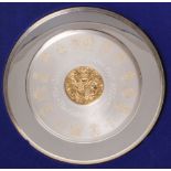 A modern parcel-gilt Elizabeth II silver commemorative silver platethe centre embossed with the