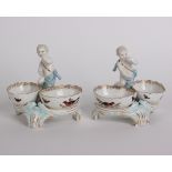 A pair of Berlin porcelain sweet meat bowls (chip to rim of one basket), h: 13cm, w: 12.5cm (2)