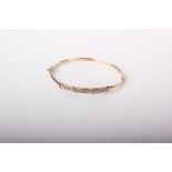 A 9ct gold and small diamond hinged bangle, Edinburgh post 2000 convention marks, 5.9g gross