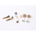 A collection of earrings, including, a pair of oval mixed cut aquamarine studs, a pair of cultured