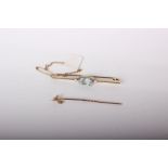 A gold and platinum fronted oval aquamarine and pearl brooch, 4.4g in total; and a 9ft gold and