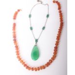 A chrysoprase pendant necklace with rectangular spacers; and an amber facetted bead necklace