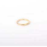 A gold wedding band, marks worn, 5.2g in total