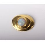 A white opal oval brooch marked '750', 14.7g gross