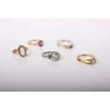 Five rings, comprising; an 18ct gold and tiny diamond solitaire ring, 3g; a 9ct gold, rectangular