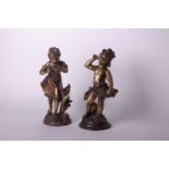 A pair of lightly patinated figures of children and a spelter figure (3)