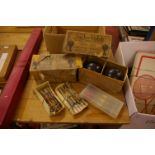 Two boxed sets Taylor-Rolph Lignum Vitae carpet bowls (4) and three vintage sets of darts, a boxed