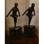 A pair of patinated metal figures of dancers, of recent manufacture, after the manner of Chiparus,