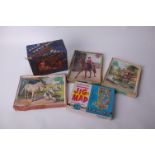 Five vintage jigsaw puzzles including; Delta Series 'The World' (ten pieces missing), two children'