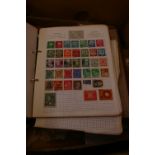 Stamps: An accumulation including first day covers, three stamp albums and a large quantity of