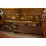 Tools a Victorian fitted carpenters trunk in painted pine, three layers of trays with tools