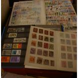 A collection of postcards, three albums and loose Edwardian to modern, an accumulation of stamps-