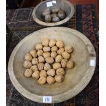 Treen: a fruit wood bowl probably 18th century or earlier, (diameter 38cm), another smaller