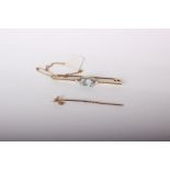 A gold and platinum-fronted oval aquamarine and pearl brooch, 4.4g in total; and a 9ft gold and
