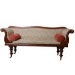 A Victorian mahogany framed sofa with arched back, scrolled arms and turned legs 192cm length